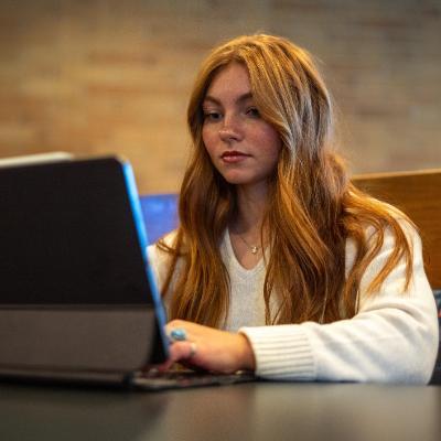 student working on computer